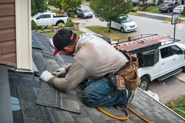 Professional Roof Replacement technician working in Zoar, OH